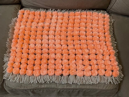 Coral and Taupe Pom Pom Blanket