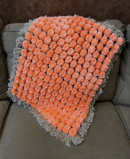 Coral and Taupe Pom Pom Blanket